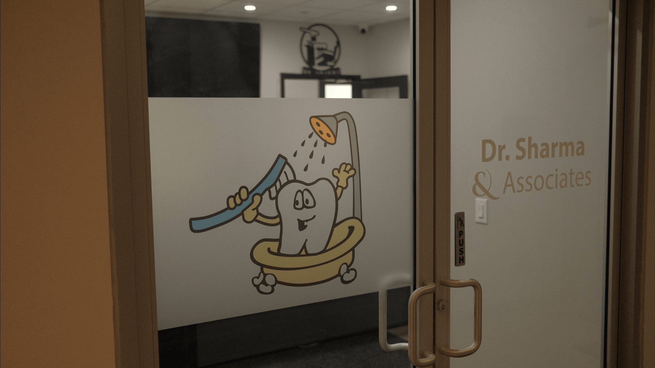 Our tooth mascot on the office door